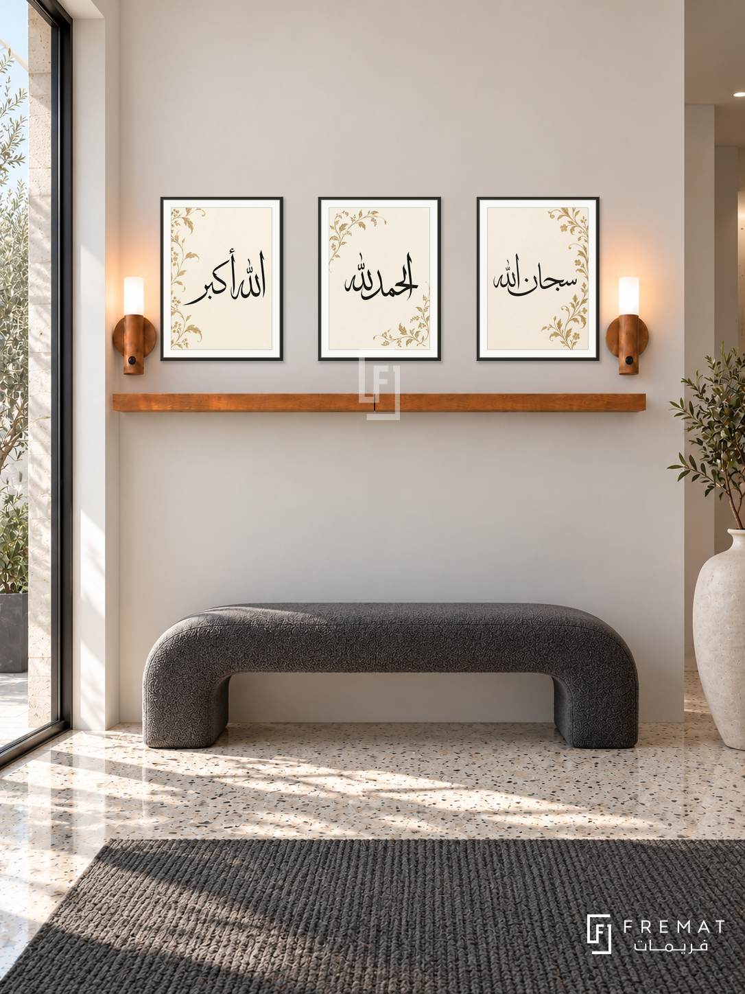FREMAT Ivory Praise shelf set with three 30 x 40 cm frames, 2 cm white borders, honey wood shelf and two warm sensor lamps. Morning sophisticated monochrome foyer, chalk ivory wall, charcoal curved bench, ivory terrazzo floor with black speckles, clear glass doorway left, sculptural ceramic urn right.