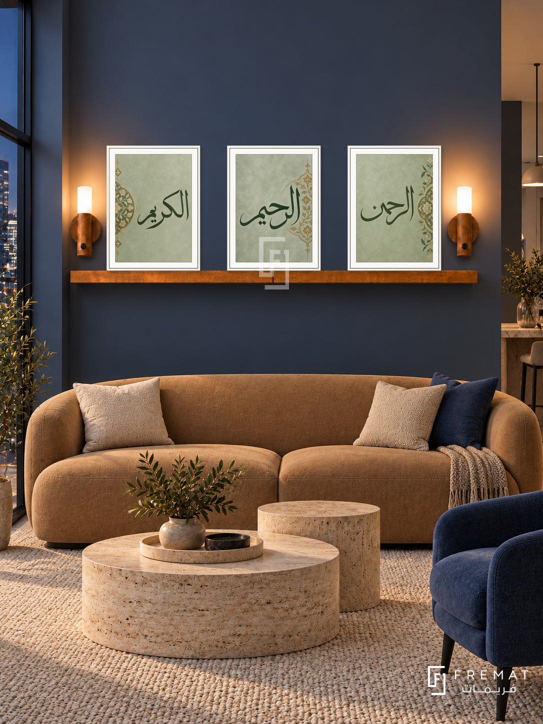 FREMAT Mercy Medallion shelf set with three 30 x 40 cm frames, 2 cm white borders, honey wood shelf and two warm sensor lamps. Night tailored blue lounge, dusty navy wall, camel curved sofa, pale travertine nested tables, neutral loop rug, city window left.