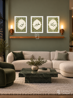 FREMAT Olive Cartouche shelf set with three 30 x 40 cm frames, 2 cm white borders, honey wood shelf and two warm sensor lamps. Night moss green lounge, soft green wall, ivory curved sectional, dark green marble coffee table, thick pale rug, dark window left.