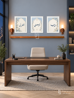 FREMAT Blue Prayer shelf set with three 30 x 40 cm frames, 2 cm white borders, honey wood shelf and two warm sensor lamps. Night blue contemporary home office, mist grey-blue wall, walnut desk clearly below shelf, cream swivel chair, pale parquet, dark window left, sleek polished setting.