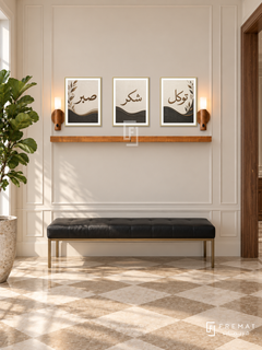 FREMAT Charcoal Linen shelf set with three 30 x 40 cm frames, 2 cm white borders, honey wood shelf and two warm sensor lamps. Morning tailored contemporary foyer, cream panelled wall, black leather bench with brass legs, checkerboard beige tiles, walnut doorway right, tall green fig tree left.
