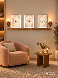 FREMAT Apricot Calm shelf set with three 30 x 40 cm wooden texture frames, 2 cm white borders, honey wood shelf and two warm sensor lamps. Night warm minimalist reading corner, pale sand wall, peach fabric armchair, walnut triangular side table, beige textured rug, amber niche left.