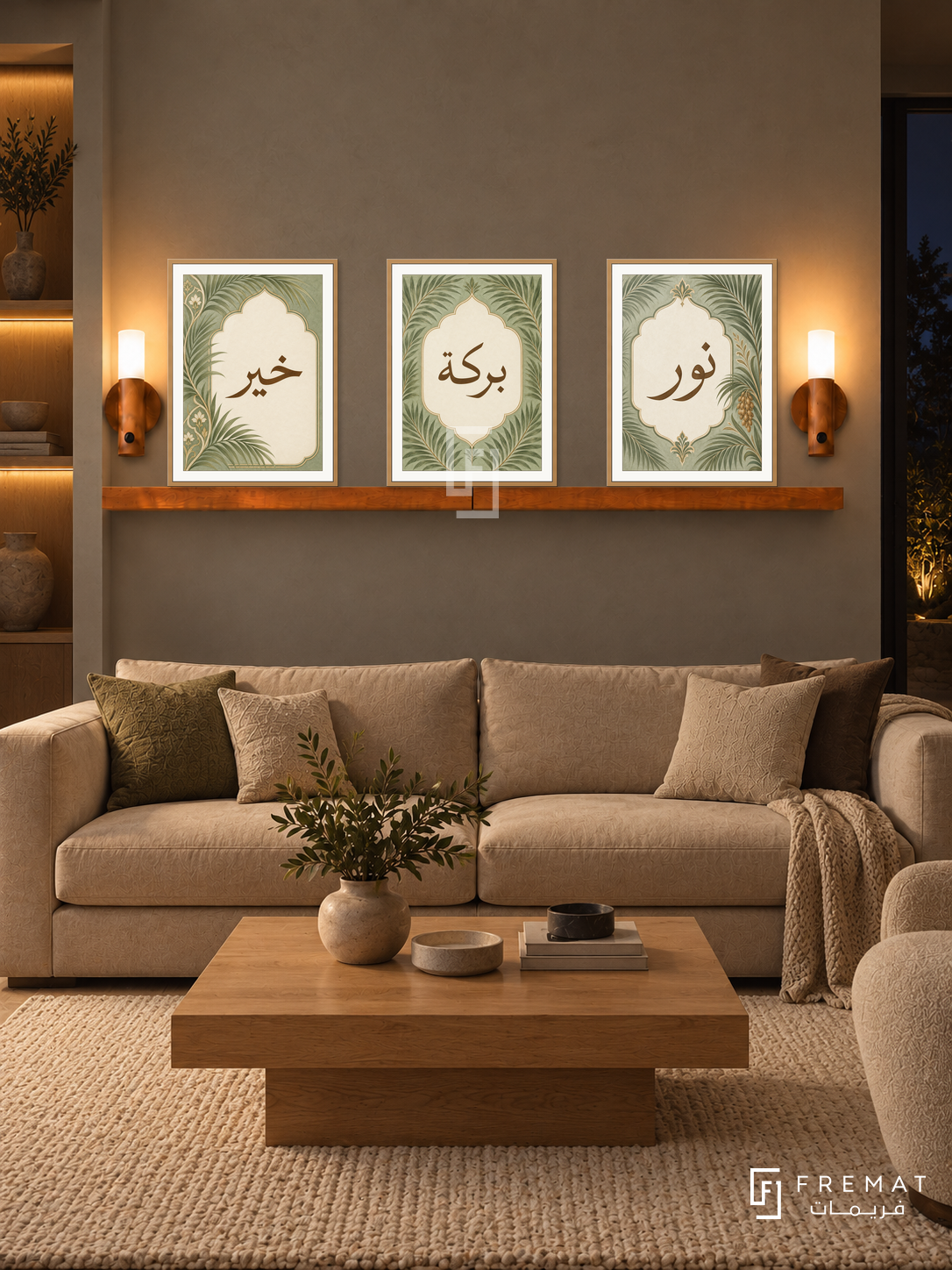 FREMAT Palm Cartouche shelf set with three 30 x 40 cm wooden texture frames, 2 cm white borders, honey wood shelf and two warm sensor lamps. Night organic modern living room, moss grey plaster wall, tan sofa, low square oak table, cream textured rug, amber niche far left.