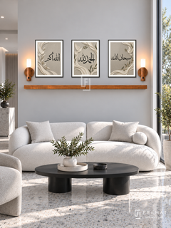 FREMAT Dove Praise shelf set with three 30 x 40 cm black frames, 2 cm white borders, honey wood shelf and two warm sensor lamps. Morning modern monochrome reception, pale dove grey wall, sculptural white sofa, black oval coffee table, light grey terrazzo, tall garden window right.