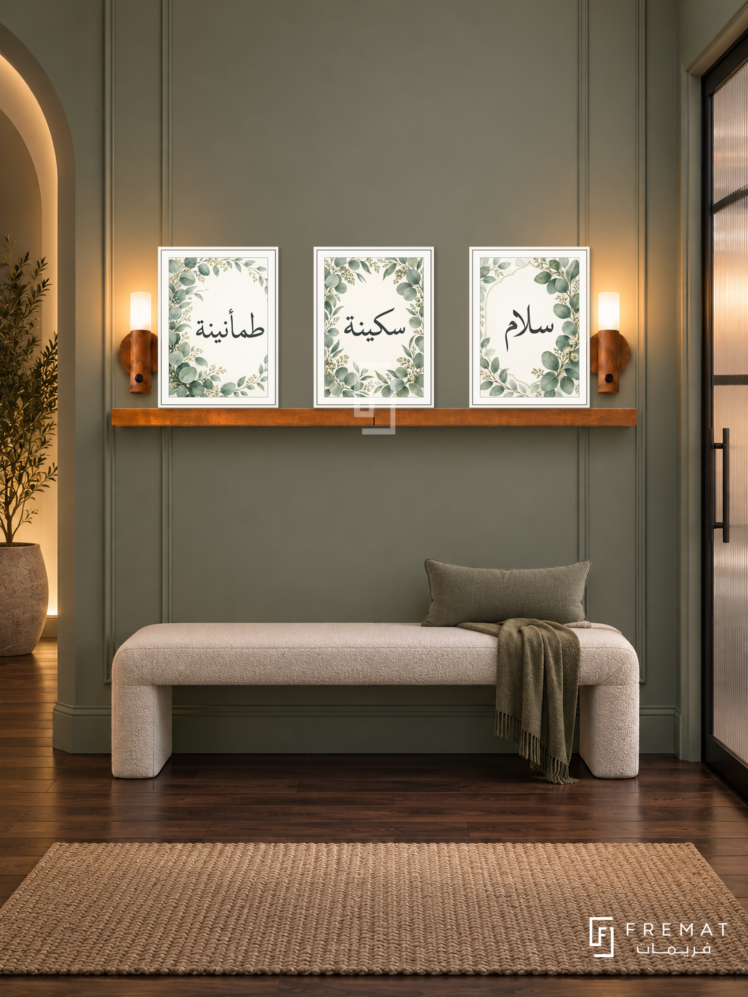 FREMAT Eucalyptus Calm shelf set with three 30 x 40 cm white frames, 2 cm white borders, honey wood shelf and two warm sensor lamps. Night refined sage hallway, muted eucalyptus wall with thin vertical mouldings, white upholstered bench, dark walnut flooring, frosted glass door right and softly lit arch left.