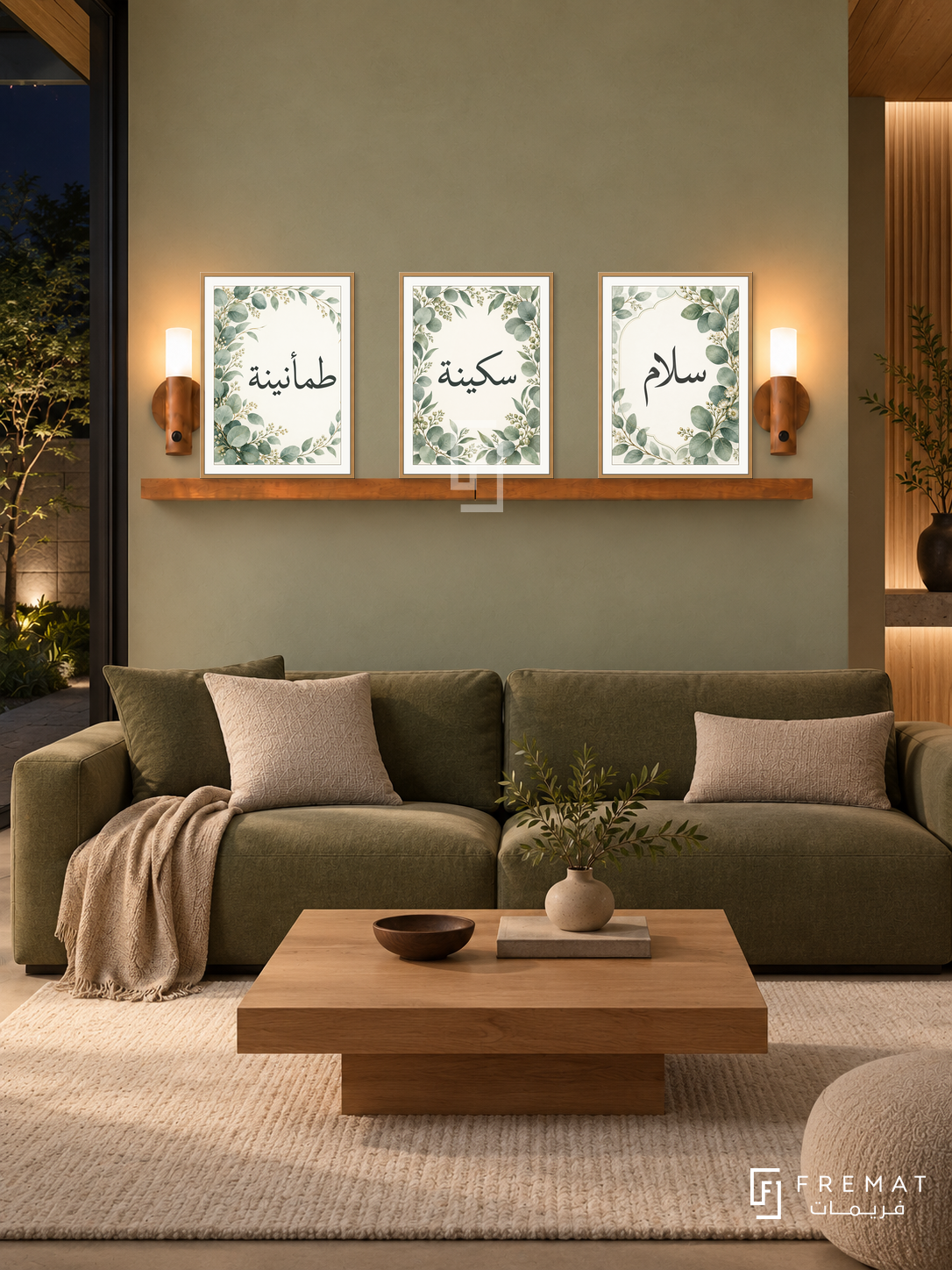 FREMAT Eucalyptus Calm shelf set with three 30 x 40 cm wooden texture frames, 2 cm white borders, honey wood shelf and two warm sensor lamps. Night Japanese-inspired quiet lounge, pale green plaster wall, low olive sofa, square oak coffee table, pale wool rug, dark courtyard through window left.