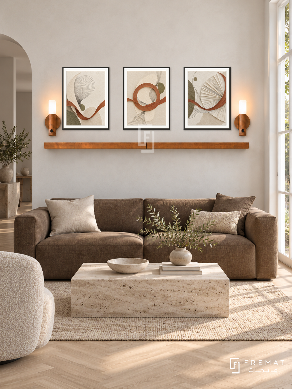 FREMAT Woven Light shelf set with three 30 x 40 cm black frames, 2 cm white borders, honey wood shelf and two warm sensor lamps. Morning Belgian minimalist reception, chalk white limewash wall, tobacco brown linen sofa with low square arms, travertine block coffee table, pale herringbone oak floor, bright French window right.
