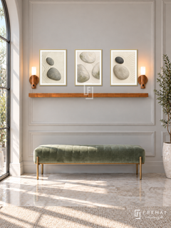 FREMAT Pebble Garden shelf set with three 30 x 40 cm gold frames, 2 cm white borders, honey wood shelf and two warm sensor lamps. Morning contemporary classic reception, pale grey moulded wall, sage velvet bench with brass feet, light marble floor, sunny glazed arch left, slender plant far right.