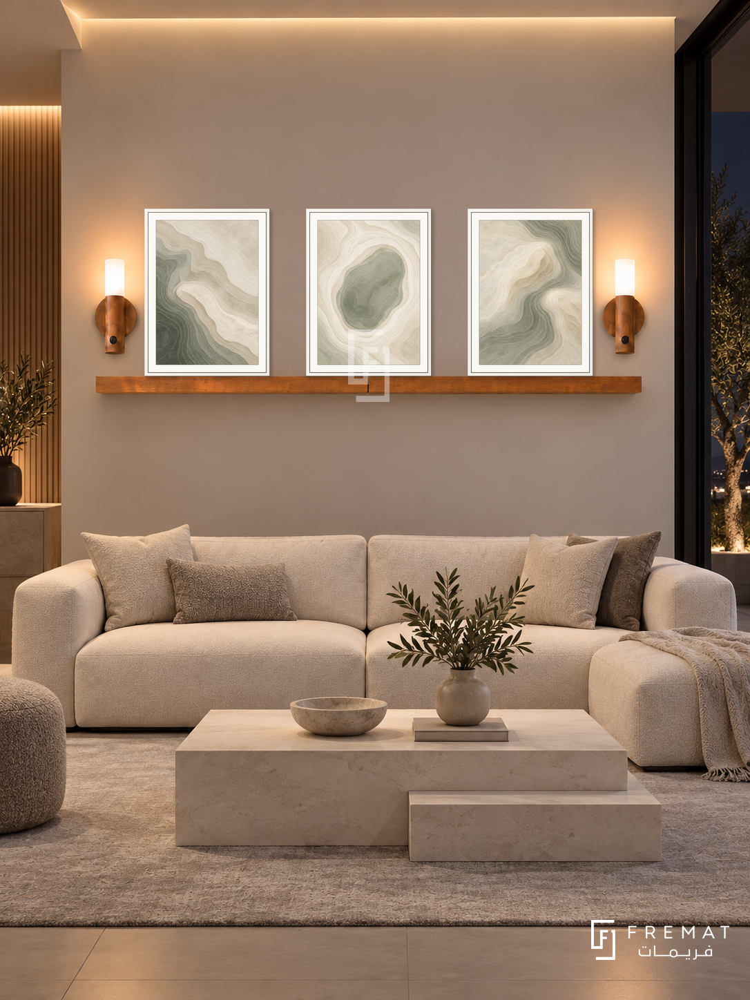 FREMAT Soft Topography shelf set with three 30 x 40 cm white frames, 2 cm white borders, honey wood shelf and two warm sensor lamps. Night minimalist reception, light taupe wall, ivory low sofa, stepped white stone coffee table, subtle grey rug, dark glazed patio right, warm ceiling perimeter lighting.