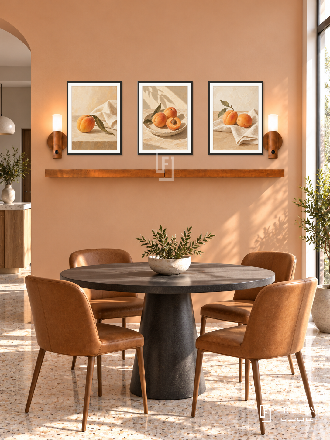 FREMAT Sunlit Apricot shelf set with three 30 x 40 cm black frames, 2 cm white borders, honey wood shelf and two warm sensor lamps. Morning contemporary breakfast alcove, apricot plaster wall, charcoal round pedestal table and caramel chairs, pale terrazzo, sunny narrow window right, open doorway left.