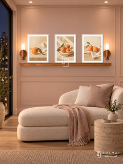 FREMAT Sunlit Apricot shelf set with three 30 x 40 cm white frames, 2 cm white borders, honey wood shelf and two warm sensor lamps. Night refined peach bedroom sitting area, pale blush panelled wall, cream upholstered chaise and travertine side table, oak floor, dark balcony glass left, gentle recessed ceiling light.