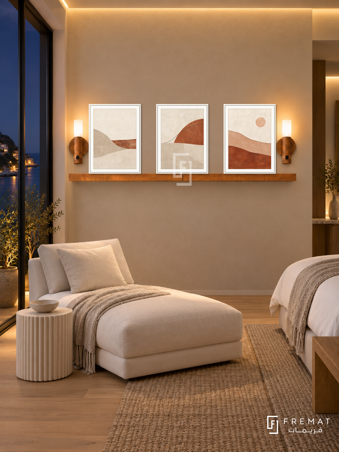 FREMAT Horizon Stitch shelf set with three 30 x 40 cm white frames, 2 cm white borders, honey wood shelf and two warm sensor lamps. Night contemporary seaside bedroom lounge, sand wall, white linen chaise and ribbed cream side table, light oak floor, dark sea-view doors left, subtle warm ceiling cove.