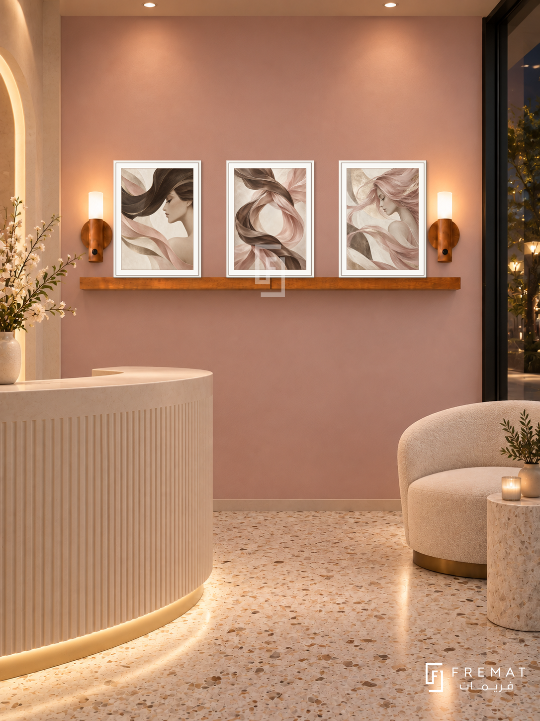 FREMAT Silk Motion shelf set with three 30 x 40 cm white frames, 2 cm white borders, honey wood shelf and two warm sensor lamps. Night boutique beauty salon reception, dusty pink wall, curved ivory reception desk low foreground left, cream waiting chair right, terrazzo floor, dark storefront right, warm ceiling spots.