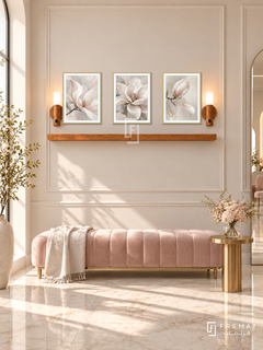 FREMAT Pearl Bloom shelf set with three 30 x 40 cm gold frames, 2 cm white borders, honey wood shelf and two warm sensor lamps. Morning refined bridal beauty studio, cream moulded wall, pale rose velvet bench and brass side table, cream marble floor, sunlight from left, tall mirror far right outside product area.