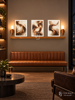 FREMAT Copper Waves shelf set with three 30 x 40 cm wooden texture frames, 2 cm white borders, honey wood shelf and two warm sensor lamps. Night boutique barber lounge, taupe wall, cognac leather bench and walnut side cabinet, oak floor, dark window right, gently lit shelving far left.