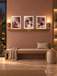FREMAT Rose Atelier shelf set with three 30 x 40 cm wooden texture frames, 2 cm white borders, honey wood shelf and two warm sensor lamps. Night organic skincare studio, muted rose clay wall, oak bench with linen cushion and squat ceramic side table, warm stone floor, dark garden opening left, lit niche right.