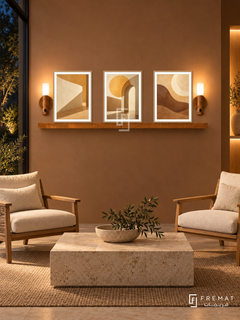 FREMAT Golden Hour shelf set with three 30 x 40 cm wooden texture frames, 2 cm white borders, honey wood shelf and two warm sensor lamps. Night organic salon waiting alcove, caramel clay wall, oak lounge chairs with ivory cushions, rectangular limestone table, dark garden window left, warm vertical niche far right.