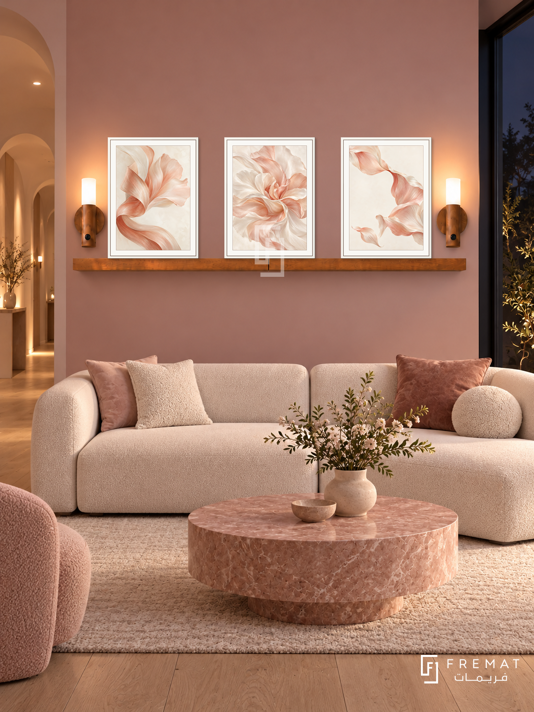 FREMAT Satin Petals shelf set with three 30 x 40 cm white frames, 2 cm white borders, honey wood shelf and two warm sensor lamps. Night feminine skincare salon lounge, dusty rose wall, white modular settee and pink stone table, pale oak floor, dark window right, softly lit arched corridor left.
