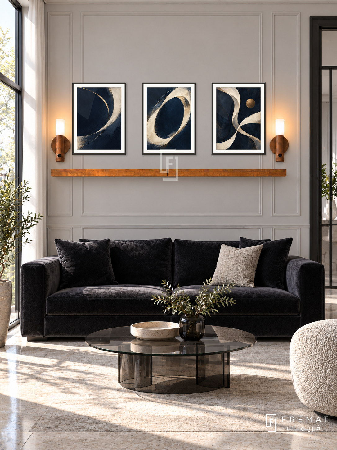 FREMAT Midnight Grace shelf set with three 30 x 40 cm black frames, 2 cm white borders, honey wood shelf and two warm sensor lamps. Morning high contrast beauty atelier, pale grey panelled wall, black velvet sofa and smoked glass table, pale stone floor, bright window left, black framed doorway right.
