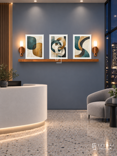 FREMAT Connected Forms shelf set with three 30 x 40 cm white frames, 2 cm white borders, honey wood shelf and two warm sensor lamps. Night technology office reception, muted slate blue wall, white curved front desk low left and grey armchair right, terrazzo floor, dark city glass right, soft ceiling spots.