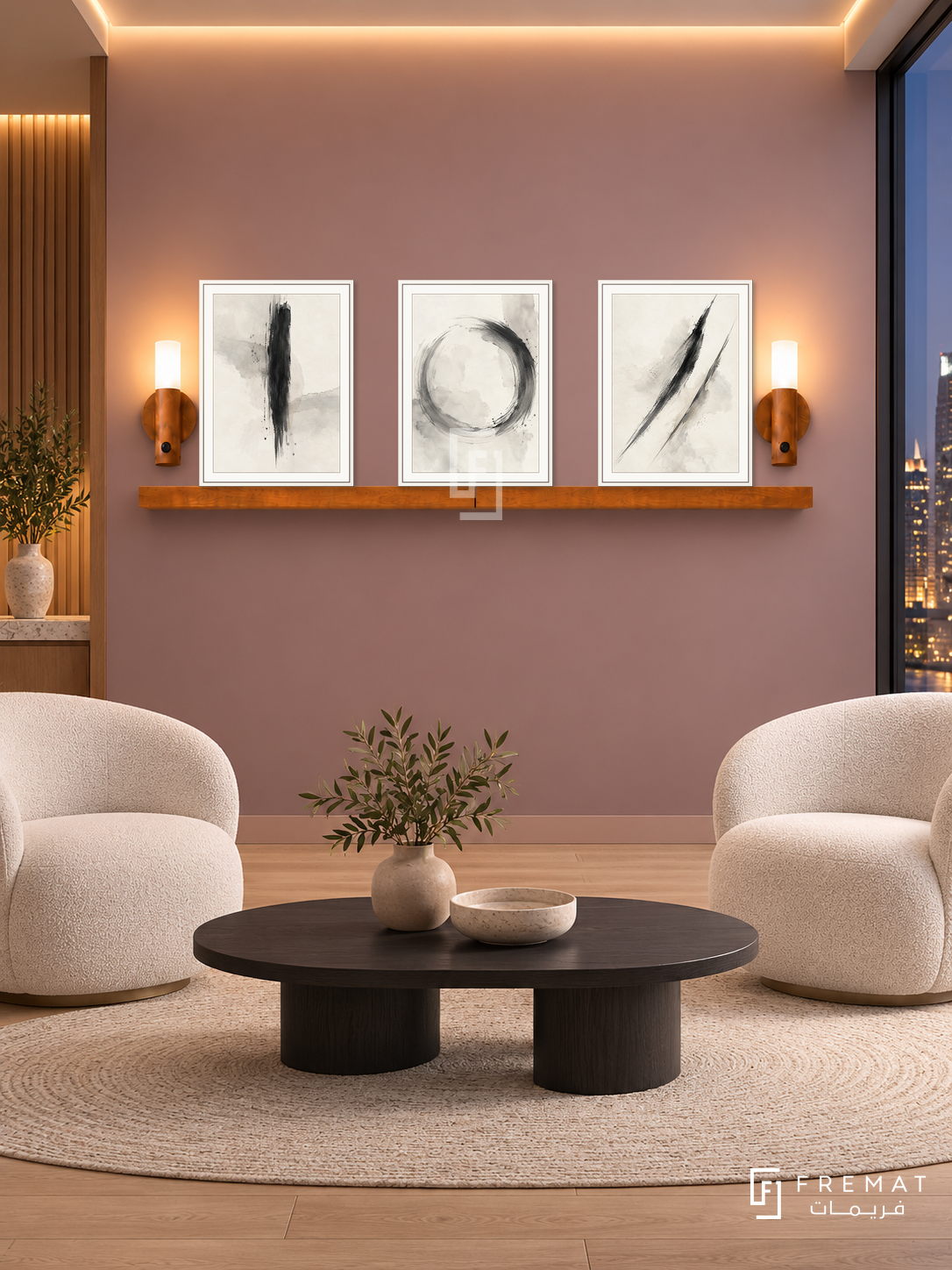 FREMAT Quiet Focus shelf set with three 30 x 40 cm white frames, 2 cm white borders, honey wood shelf and two warm sensor lamps. Night design agency breakout room, dusty mauve display wall, white sculptural lounge chairs, black oval coffee table, pale oak floor, skyline glass right, warm ceiling perimeter lighting.