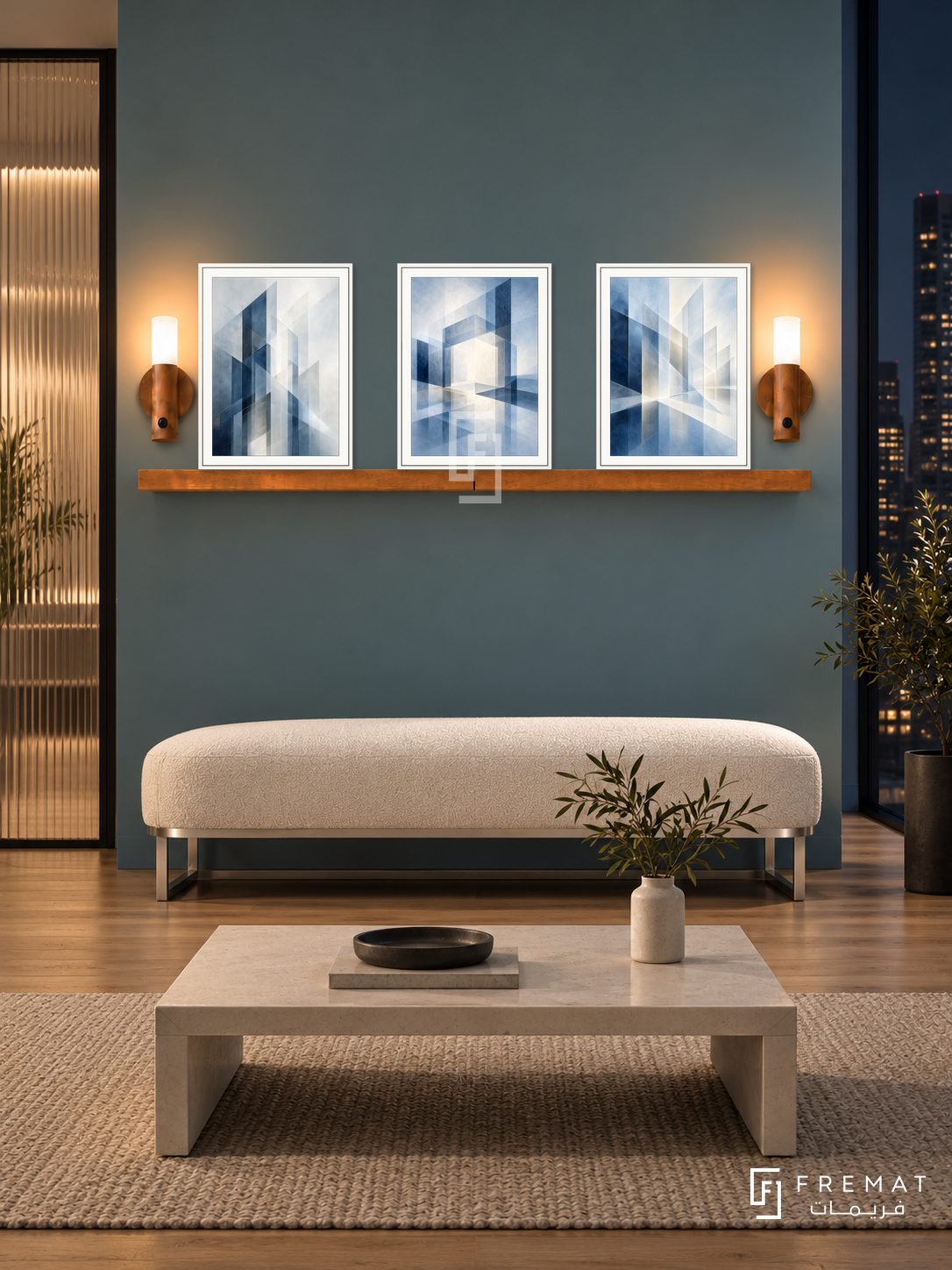 FREMAT Blueprints Of Light shelf set with three 30 x 40 cm white frames, 2 cm white borders, honey wood shelf and two warm sensor lamps. Night minimal design office waiting area, dusty teal display wall, ivory boucle bench with steel base, low pale rectangular table, oak floor, dark skyline right and ribbed glass doorway left.