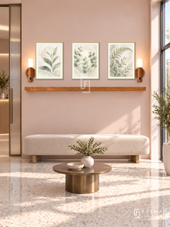 FREMAT Gentle Growth shelf set with three 30 x 40 cm gold frames, 2 cm white borders, honey wood shelf and two warm sensor lamps. Morning refined dermatology waiting lounge, pale blush display wall, beige upholstered bench, slim bronze round table, pale terrazzo floor, sunny tall window right, fluted glass door left.
