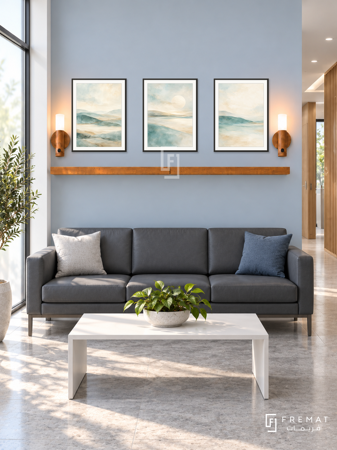 FREMAT Soft Horizon shelf set with three 30 x 40 cm black frames, 2 cm white borders, honey wood shelf and two warm sensor lamps. Morning contemporary medical consultation waiting area, pale warm blue display wall, charcoal vinyl settee, rectangular white table, light grey stone floor, frosted sunny window left, pale timber corridor right.
