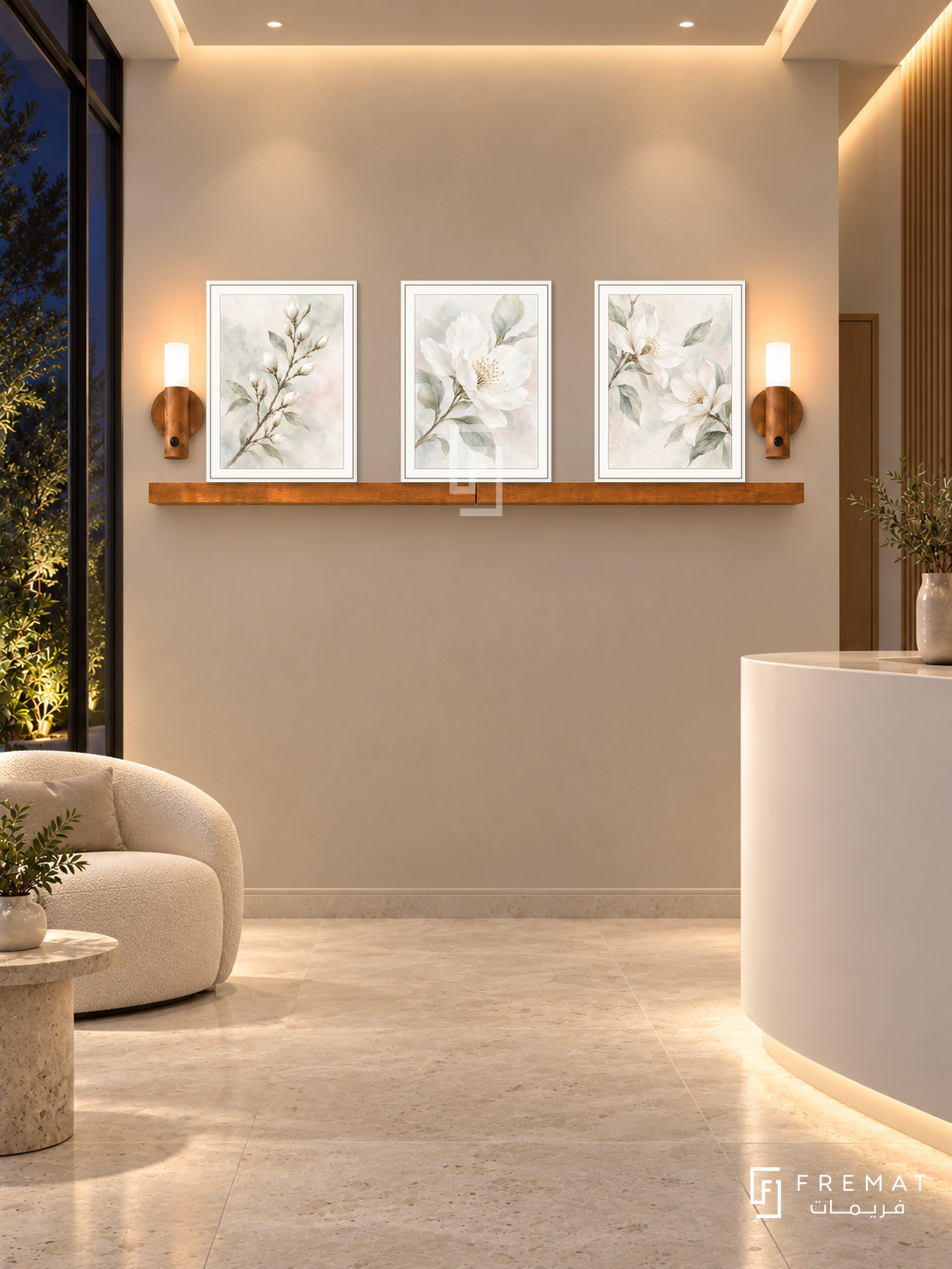 FREMAT White Blossom shelf set with three 30 x 40 cm white frames, 2 cm white borders, honey wood shelf and two warm sensor lamps. Night boutique medical reception, pearl beige display wall, white rounded counter lower right, ivory guest chair left, pale stone floor, dark garden glazing left, softly glowing ceiling slots.