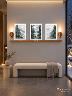 FREMAT Misty Pines shelf set with three 30 x 40 cm white frames, 2 cm white borders, honey wood shelf and two warm sensor lamps. Night Nordic entrance hall, ice grey plaster, ivory bench, pale birch side table, slate floor, snow garden glazing right, warm ceiling wash.