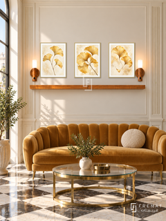 FREMAT Ginkgo Gold shelf set with three 30 x 40 cm gold frames, 2 cm white borders, honey wood shelf and two warm sensor lamps. Morning Art Deco sitting room, cream geometric panelling, ochre scalloped sofa, brass and glass round table, chequered marble floor, tall window left.