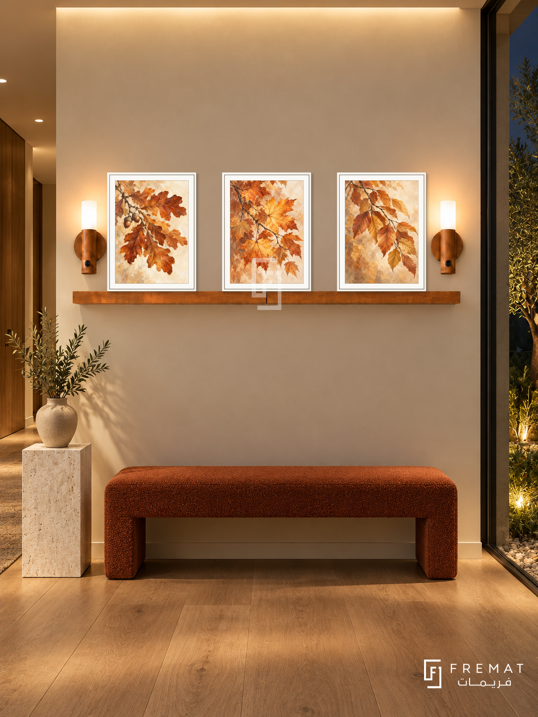 FREMAT Autumn Canopy shelf set with three 30 x 40 cm white frames, 2 cm white borders, honey wood shelf and two warm sensor lamps. Night contemporary corridor, warm cream wall, rust upholstered bench, white travertine pedestal, oak floor, glazed garden right, concealed ceiling lighting.