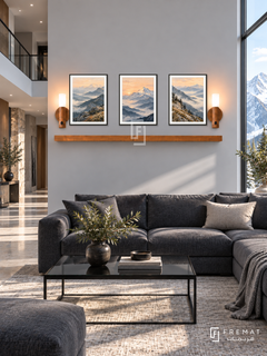 FREMAT Mountain Light shelf set with three 30 x 40 cm black frames, 2 cm white borders, honey wood shelf and two warm sensor lamps. Morning modern mountain penthouse, cool grey wall, charcoal sectional, black glass table, light stone floor, snowy mountain window right, double-height passage left.