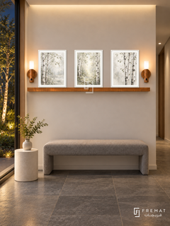 FREMAT Birch Whisper shelf set with three 30 x 40 cm white frames, 2 cm white borders, honey wood shelf and two warm sensor lamps. Night Nordic corridor, warm white wall, grey upholstered bench, white cylinder table, slate tiles, birch garden window left, concealed ceiling wash.