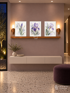 FREMAT Iris Poetry shelf set with three 30 x 40 cm white frames, 2 cm white borders, honey wood shelf and two warm sensor lamps. Night contemporary entrance, soft mauve plaster wall, ivory floating console below, plum ottoman, terrazzo floor, dark courtyard through narrow window left, recessed ceiling lighting.