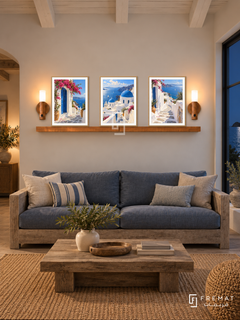 FREMAT Aegean Light shelf set with three 30 x 40 cm wooden texture frames, 2 cm white borders, honey wood shelf and two warm sensor lamps. Night island cottage living room, warm white wall, weathered oak sofa with blue linen cushions, low timber table, sisal rug, dark sea window right, white ceiling beams.
