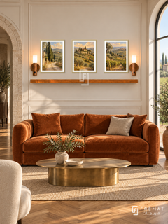FREMAT Tuscan Afternoon shelf set with three 30 x 40 cm gold frames, 2 cm white borders, honey wood shelf and two warm sensor lamps. Morning refined Tuscan reception, cream panelled wall, burnt orange velvet sofa, brass oval table, parquet, tall vineyard window right, stone doorway left.