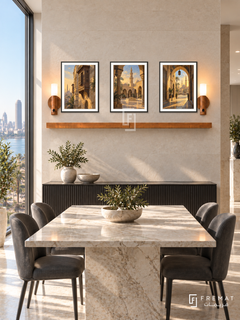 FREMAT Cairo Golden Hour shelf set with three 30 x 40 cm black frames, 2 cm white borders, honey wood shelf and two warm sensor lamps. Morning contemporary Cairo apartment dining area, limestone wall, black fluted sideboard, pale marble dining table, charcoal chairs, Nile skyline through side glazing.
