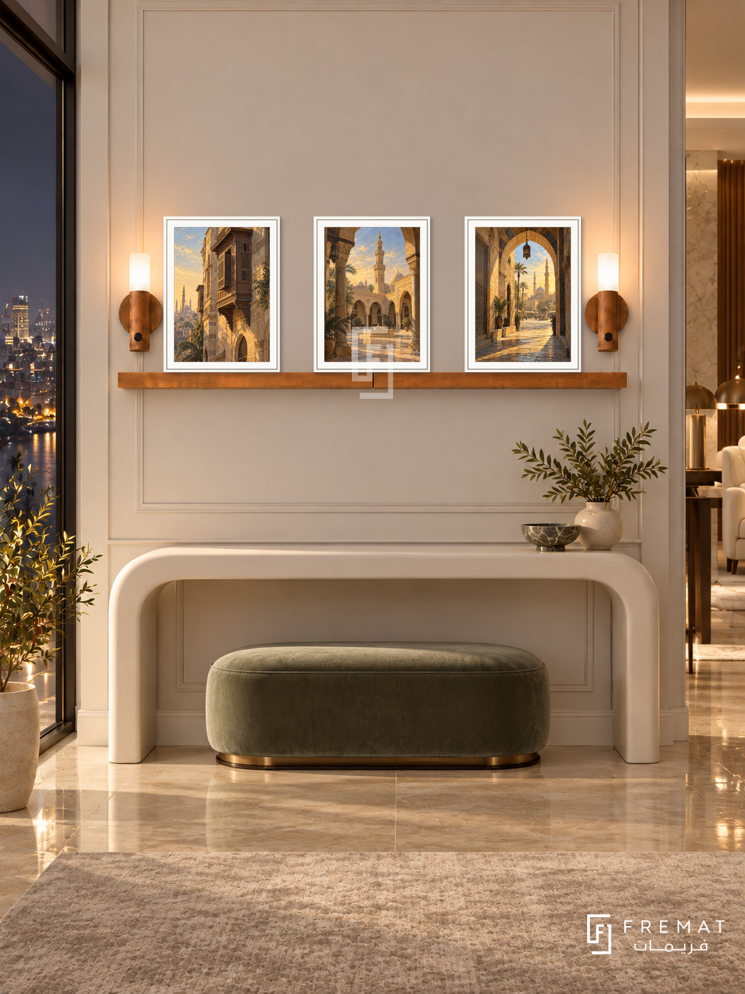 FREMAT Cairo Golden Hour shelf set with three 30 x 40 cm white frames, 2 cm white borders, honey wood shelf and two warm sensor lamps. Night Cairo refined reception foyer, ivory paneled wall, curved white console, sage velvet ottoman, polished beige floor and city lights outside.