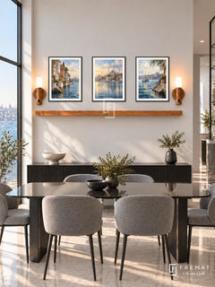 FREMAT Istanbul Blue shelf set with three 30 x 40 cm black frames, 2 cm white borders, honey wood shelf and two warm sensor lamps. Morning modern Istanbul dining loft, ivory wall, black credenza, smoked glass table and grey upholstered dining chairs, Bosphorus side window and slender steel architecture.