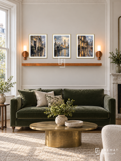 FREMAT London Rain shelf set with three 30 x 40 cm gold frames, 2 cm white borders, honey wood shelf and two warm sensor lamps. Morning London classic sitting room, pale cream molding, deep moss green velvet sofa, brass oval table, soft overcast daylight.