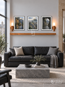 FREMAT Edinburgh Stone shelf set with three 30 x 40 cm black frames, 2 cm white borders, honey wood shelf and two warm sensor lamps. Morning Edinburgh contemporary stone townhouse, smooth pale grey wall with sandstone side doorway, black leather sofa, grey stone table, soft overcast window light.