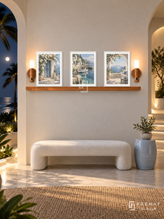 FREMAT Island Retreat shelf set with three 30 x 40 cm white frames, 2 cm white borders, honey wood shelf and two warm sensor lamps. Night island retreat entry lounge, ivory curved architecture, white upholstered bench, pale blue ceramic stool, moonlit palms and ocean at side.