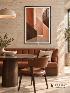 Desert Fold: Terracotta, blush, sand and dark umber planes intersect like folded architectural walls, with textured surfaces and diagonal edges. Black PVC frame displayed with a leather dining banquette and round table.
