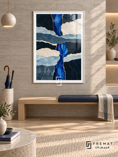 Blue Strata: Ragged, paper-like layers in navy, cobalt, slate blue and ivory cross vertically and horizontally, edged with narrow gold-colored seams. White PVC frame displayed with a pale oak entry bench with a navy cushion.
