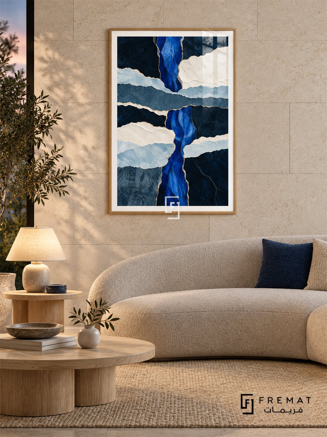 Blue Strata: Ragged, paper-like layers in navy, cobalt, slate blue and ivory cross vertically and horizontally, edged with narrow gold-colored seams. Wooden Texture PVC frame displayed with a curved cream sofa with navy cushions.