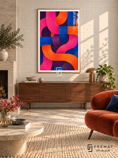 Chromatic Weave: Broad magenta, orange, cobalt and plum bands weave over and under each other, with brushed texture and rounded turns. Gold PVC frame displayed with a walnut sideboard beside a fireplace and rust chair.