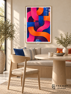 Chromatic Weave: Broad magenta, orange, cobalt and plum bands weave over and under each other, with brushed texture and rounded turns. Wooden Texture PVC frame displayed with an oak dining nook with blue and orange cushions.