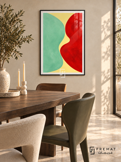 Mint Collision: A rounded mint-green mass and a vivid red form meet across a pale lemon channel, with loose painterly edges and textured color fields. Black PVC frame displayed with a dark walnut dining table with green and cream chairs.