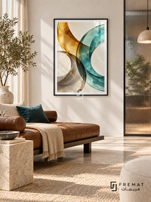 Amber Refraction: Translucent amber, teal and smoky gray ribbons curve across ivory, overlapping with luminous glass-like highlights and rippling light patterns. Black PVC frame displayed with a leather daybed beside a ribbed glass partition.